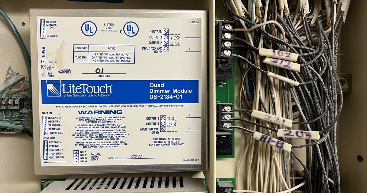 An 18-button LiteTouch keypad with engraved scene and circuit labels, the user-facing half of a panelized LiteTouch lighting control system